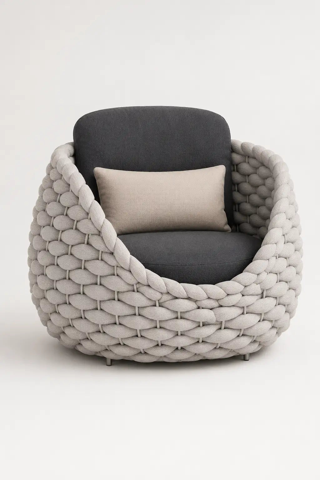Woven chair with gray cushion and pillow on a white background