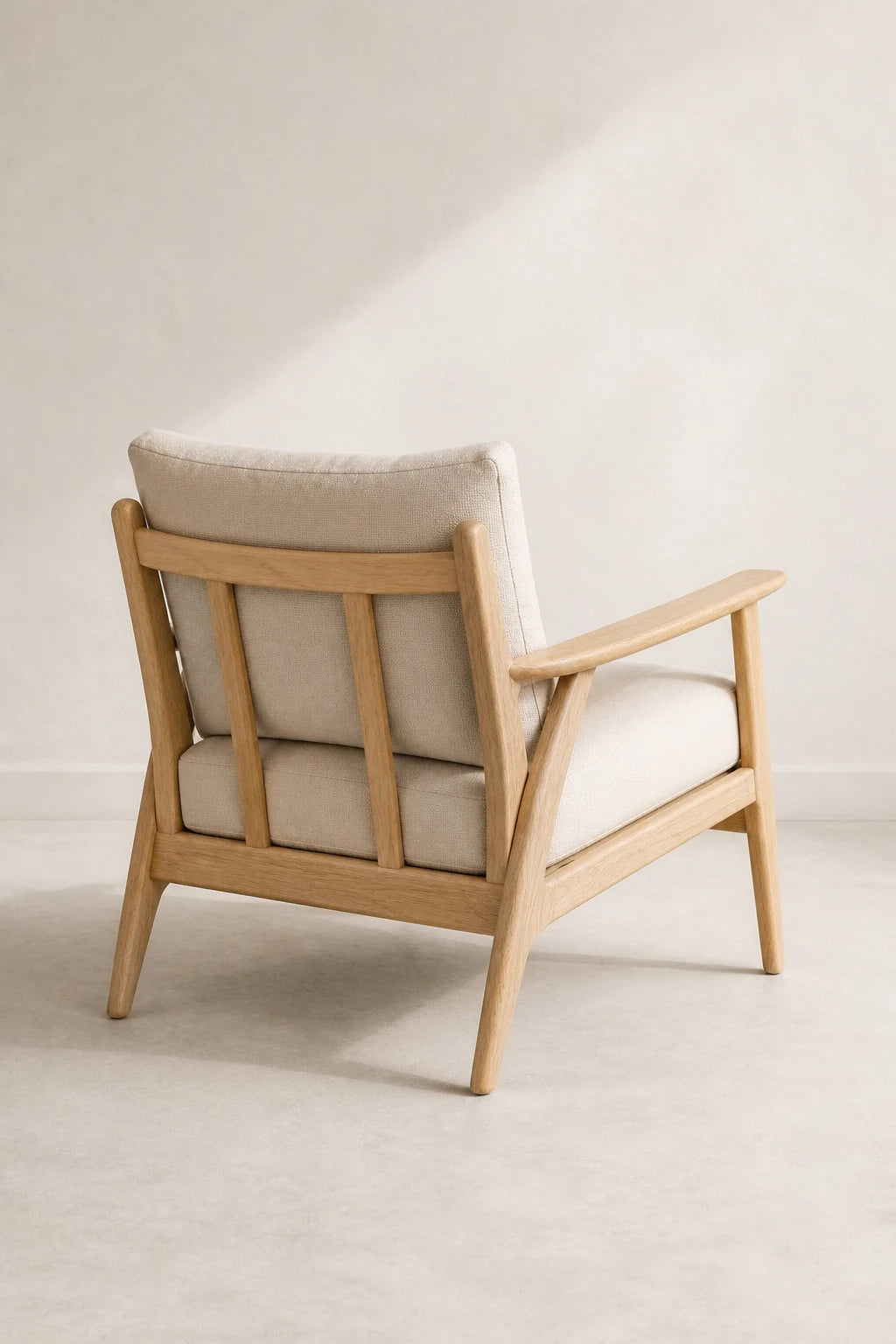 Elevated rear three-quarter view of the Arisée Hara upholstered chair