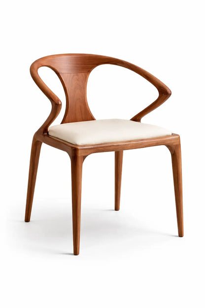 Wooden chair with a white cushion on a white background