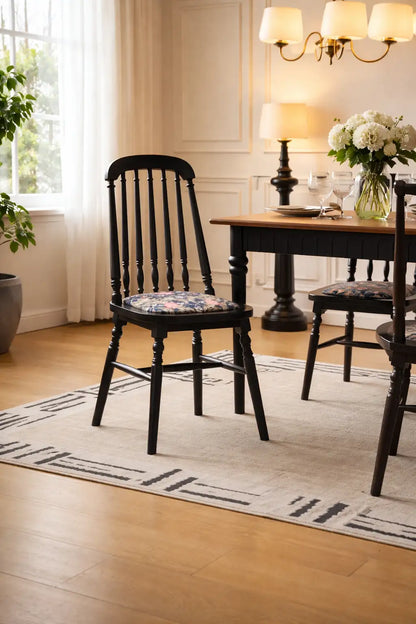 Belsize Chair black ash wood dining chair with cotton floral seat pad styled in a traditional UK dining room