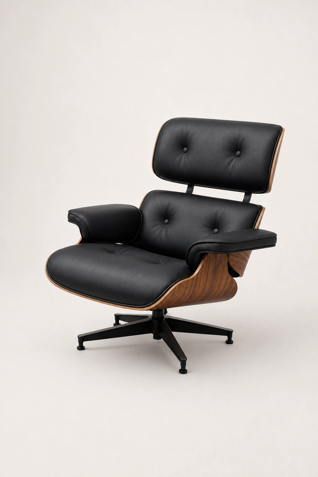 Side view of black leather executive lounge chair with curved walnut shell and five-star swivel base