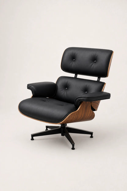 Side view of black leather executive lounge chair with curved walnut shell and five-star swivel base