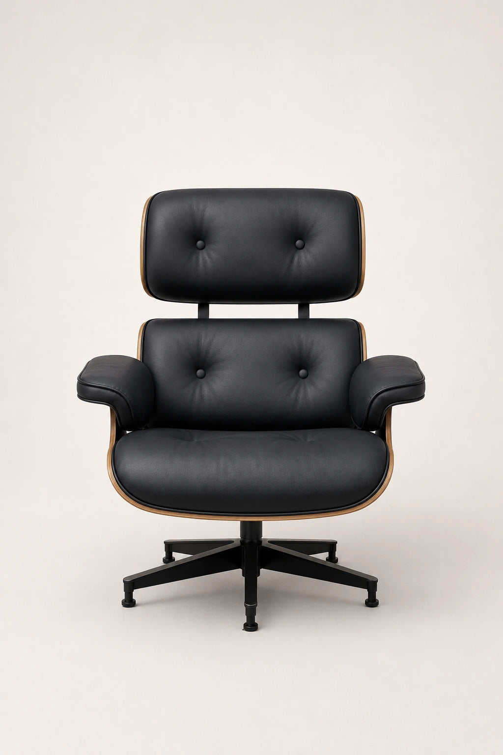 Front view of mid-century boss chair with black leather upholstery, padded armrests and swivel base