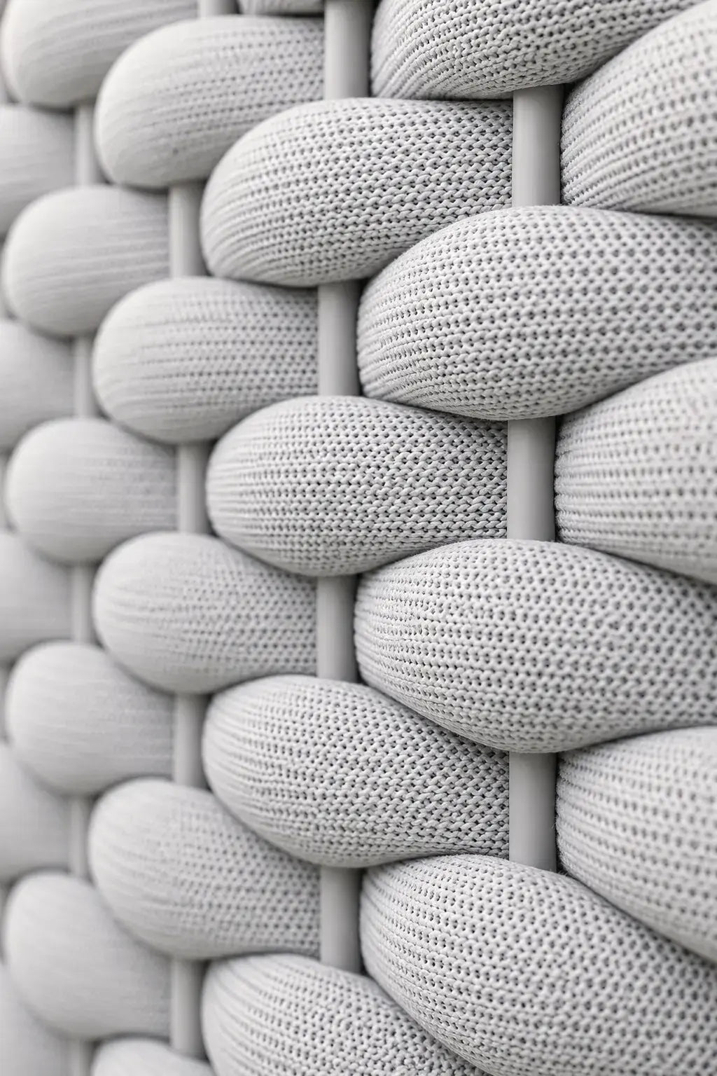 Close-up of a textured woven pattern in gray tones