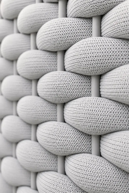 Close-up of a textured woven pattern in gray tones