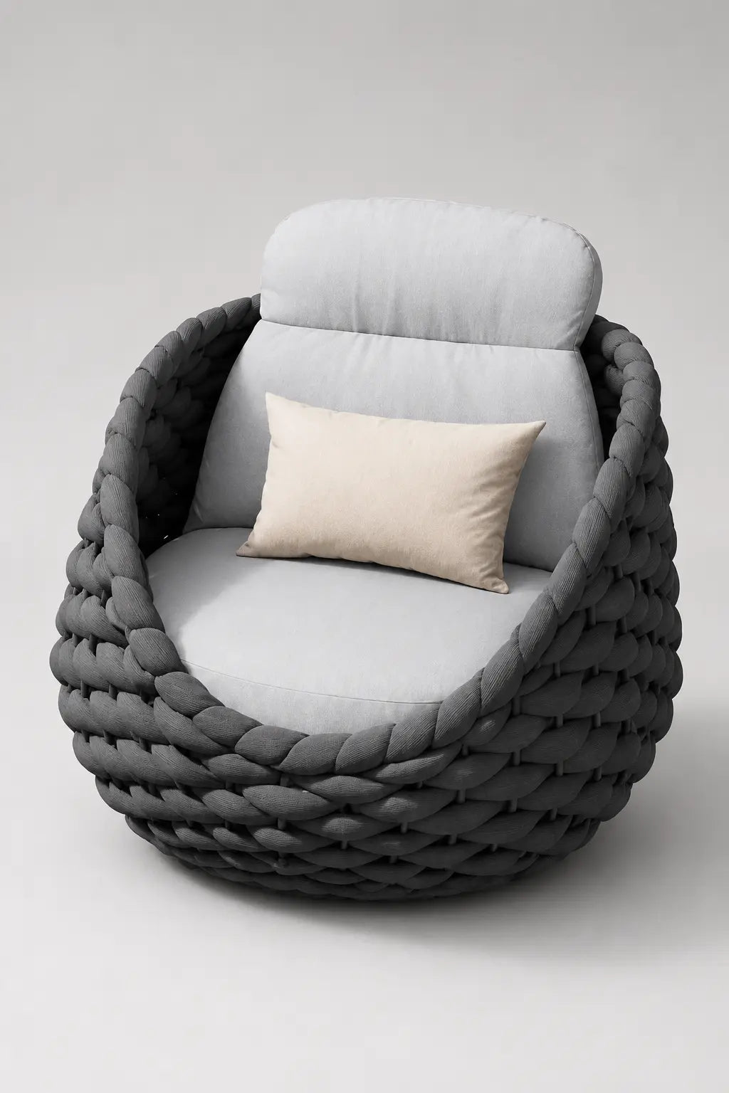 Modern chair with braided armrests and cushioned seat on a white background