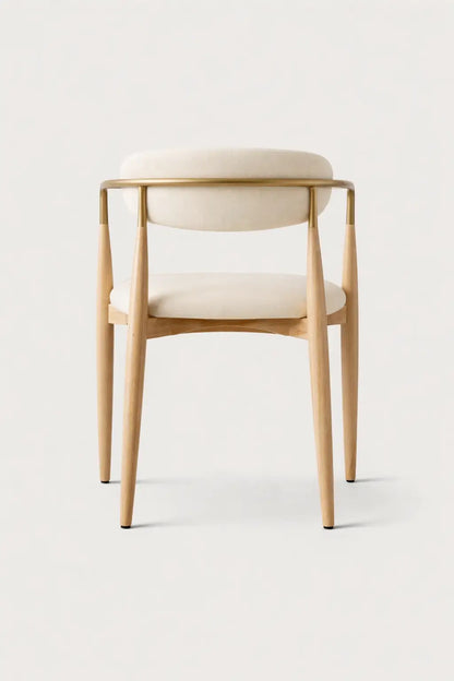 Modern ash dining chair UK in solid wood with upholstered backrest, shown in a contemporary UK dining interior.