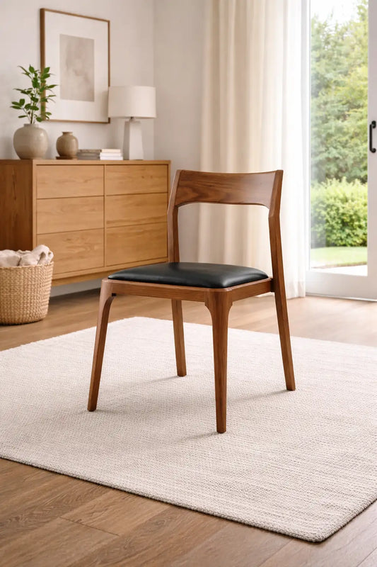 upholstered dining chair UK in black wood with velvet seat contemporary furniture design