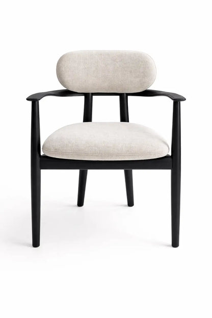 Chair with black frame and beige cushion on a white background