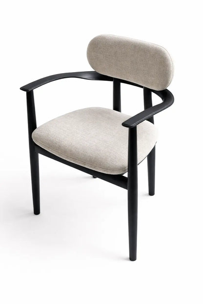 Chair with black frame and beige cushion on a white background