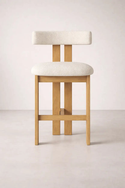Feltham wooden bar stool UK front view, solid ash kitchen island stool with upholstered bouclé seat.