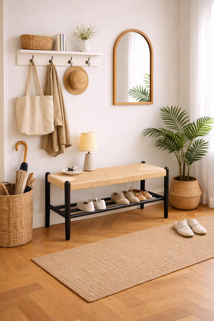 Scandinavian wooden hallway bench with shoe storage in modern UK entryway interior.