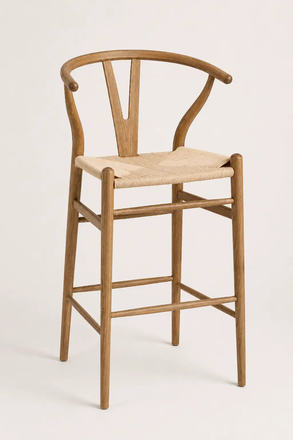 Wooden bar stool with a woven seat on a white background