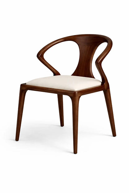 Wooden chair with a white cushion on a white background