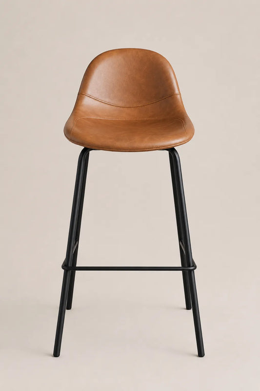 Brown leather bar stool with black metal legs on a beige background