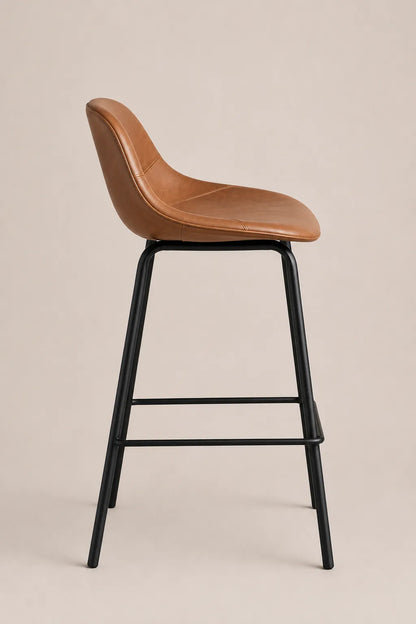 Brown bar stool with black metal legs on a beige background