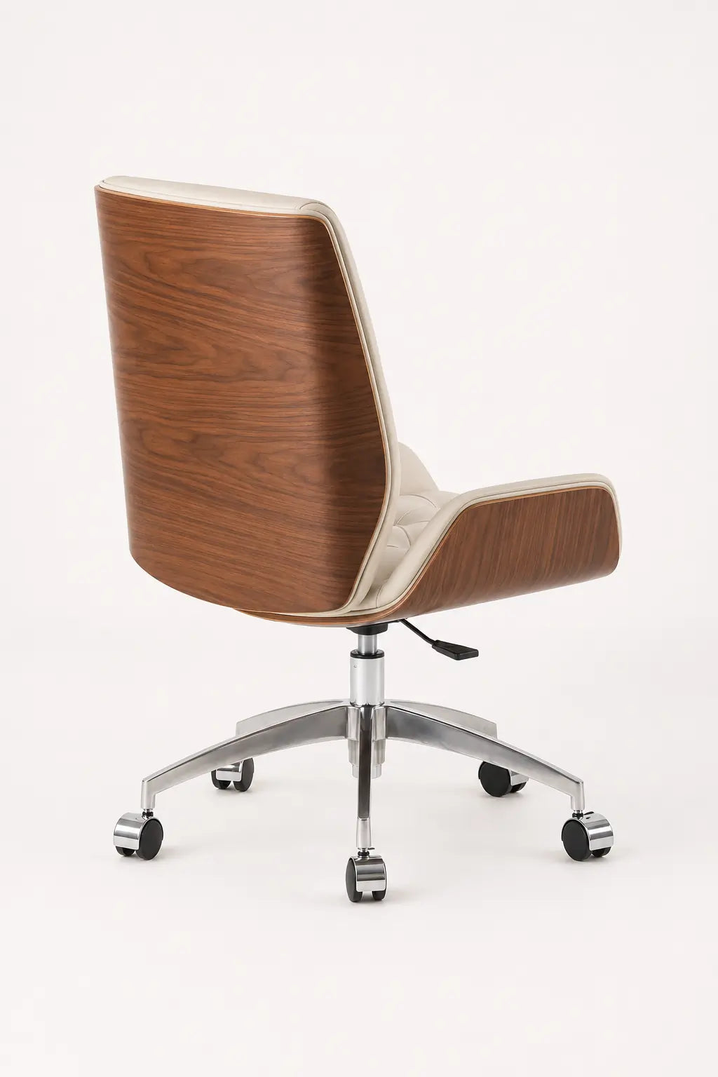 Rear three-quarter view of cream executive boss chair showing its curved walnut back shell and chrome five-wheel base